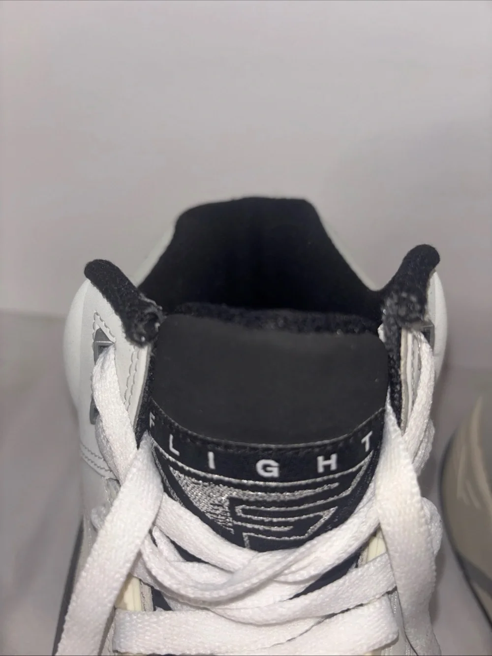 Size 15 Nike Men’s Gray and Black High-Top Sneakers